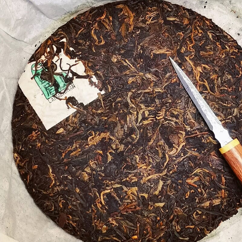 Why is Pu'er Tea Wrapped in Cotton Paper?