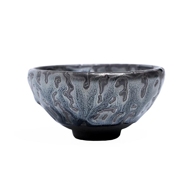 Side profile of the Oni tea cup showing a wide rim and narrower dark foot