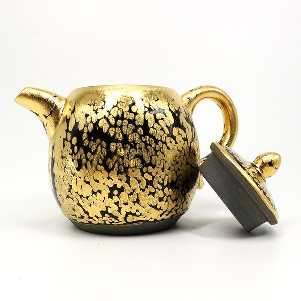 https://tenmokus.com/cdn/shop/products/gold-teapot-handmade-jianzhan-tenmoku-teapot-2_600x.jpg?v=1598414343